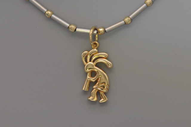 18k gold Cocopelli pendant