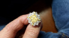 Platinum and fancy yellow diamond ring