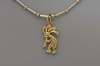 18k gold Cocopelli pendant