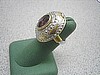 Lion and Fish 18 Karat ring with color gemstone center